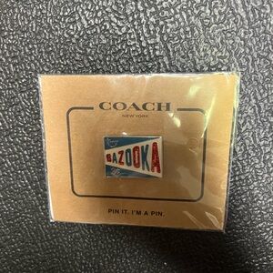 Coach Bazooka Pin in Red, Blue, and White